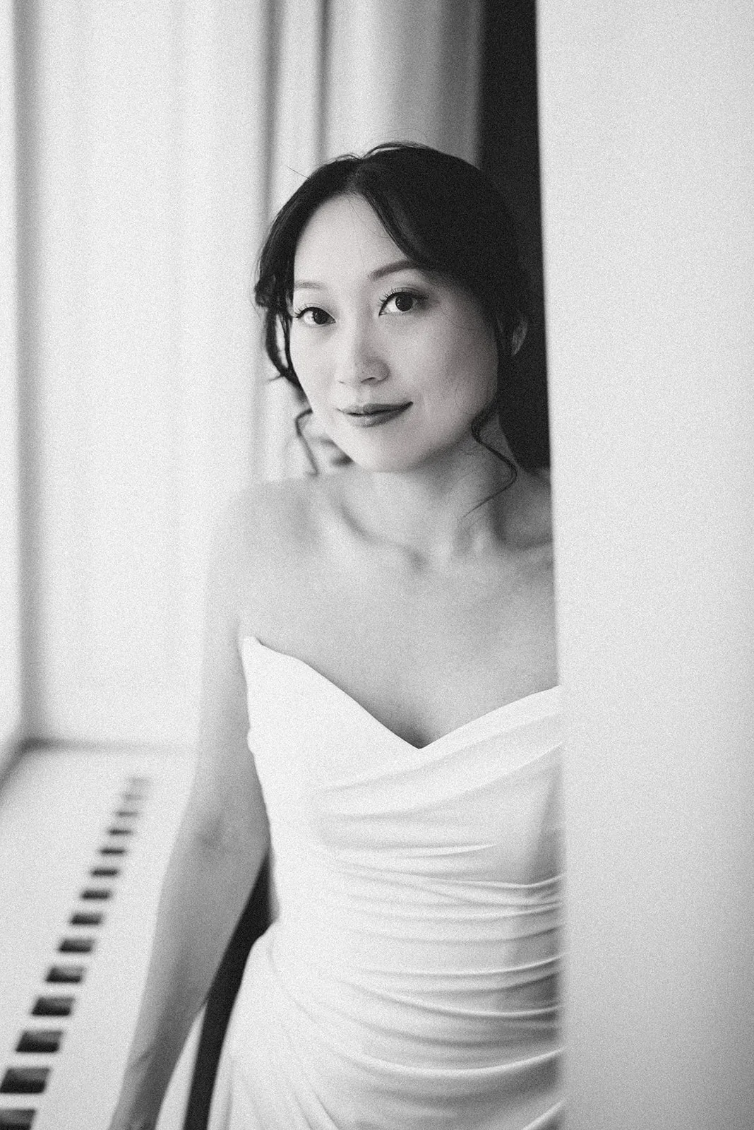Jiamin in her wedding gown, lost in thought