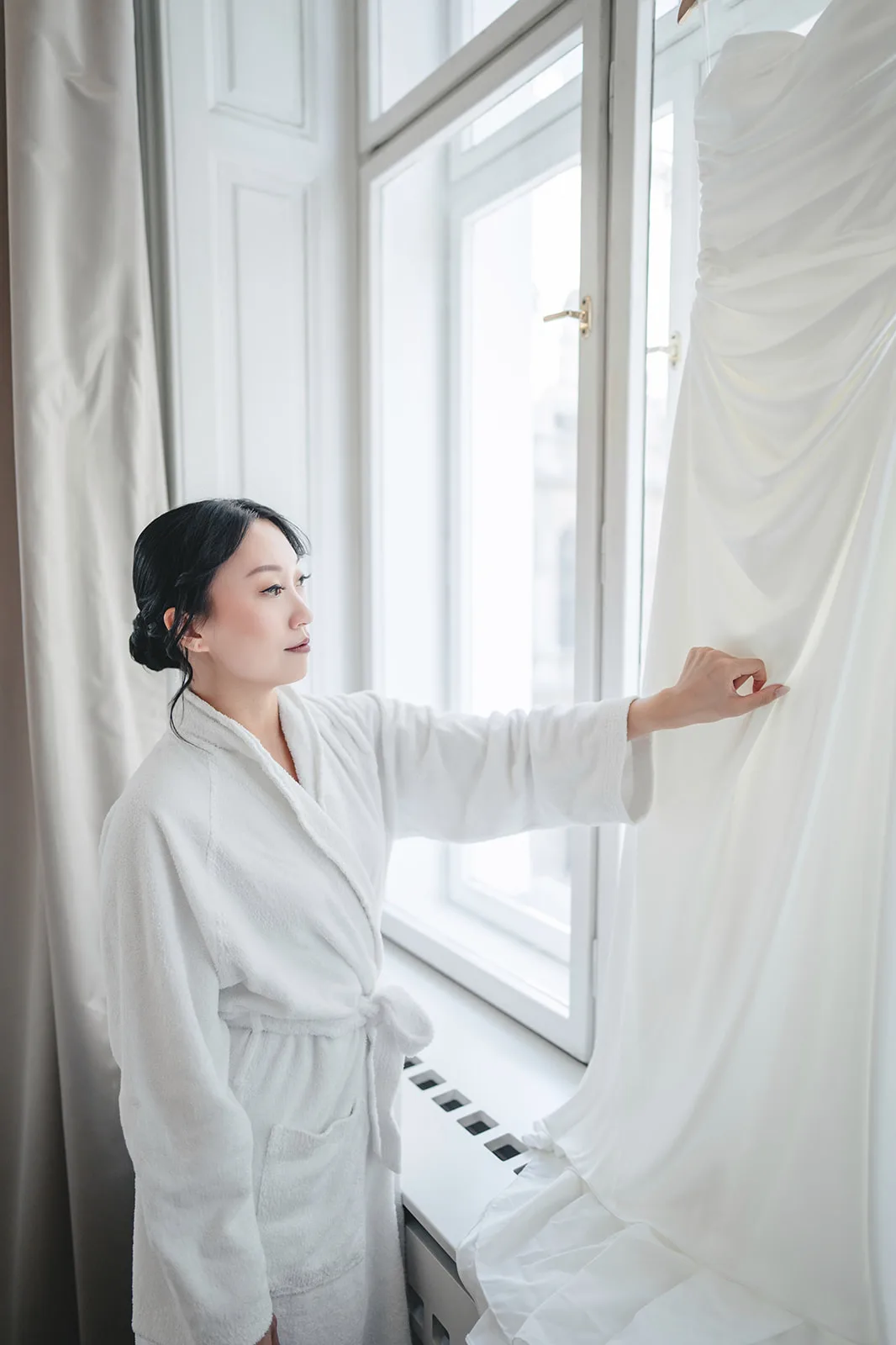 Jiamin during the getting ready, bathed in natural light