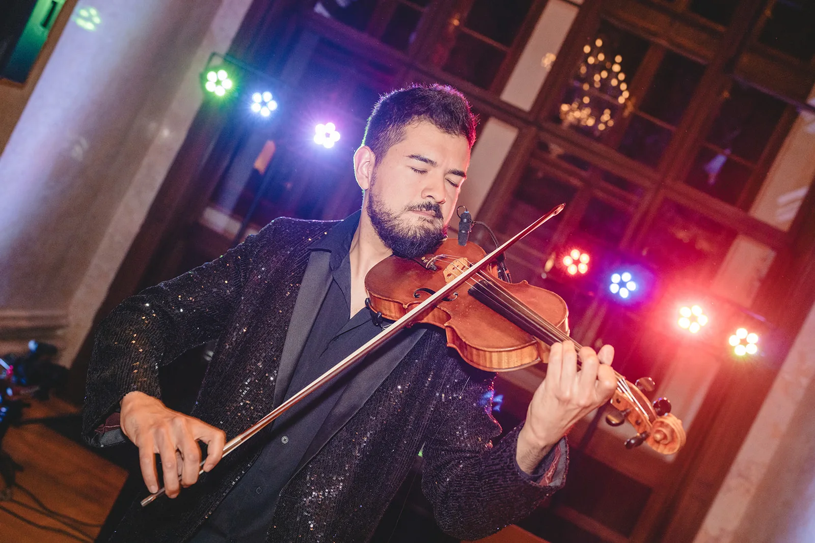 Violinist performing during the party